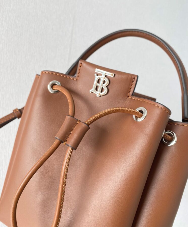 Bur.berri Monogram Motif Leather Bucket Bag