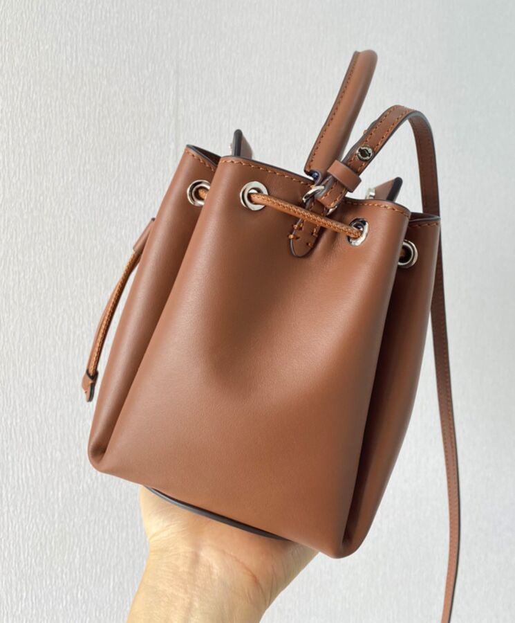 Bur.berri Monogram Motif Leather Bucket Bag