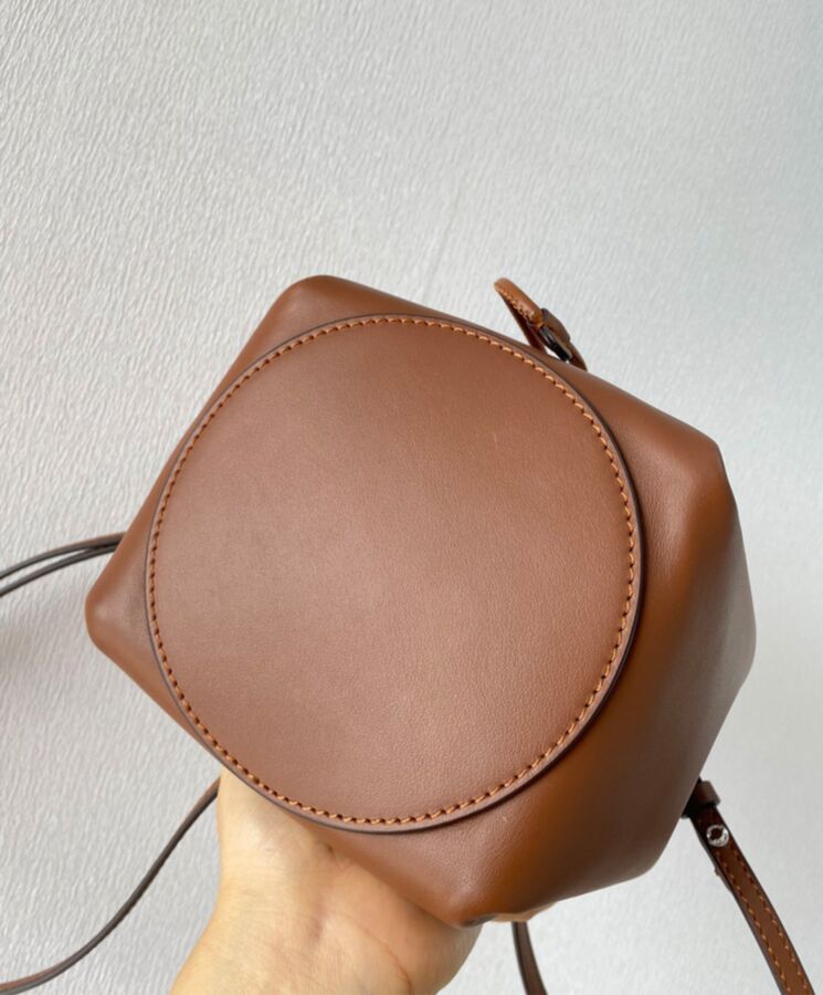 Bur.berri Monogram Motif Leather Bucket Bag