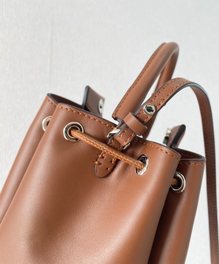 Bur.berri Monogram Motif Leather Bucket Bag