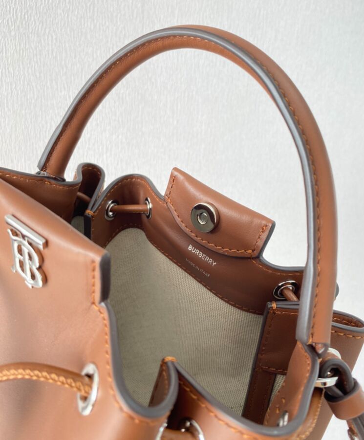 Bur.berri Monogram Motif Leather Bucket Bag