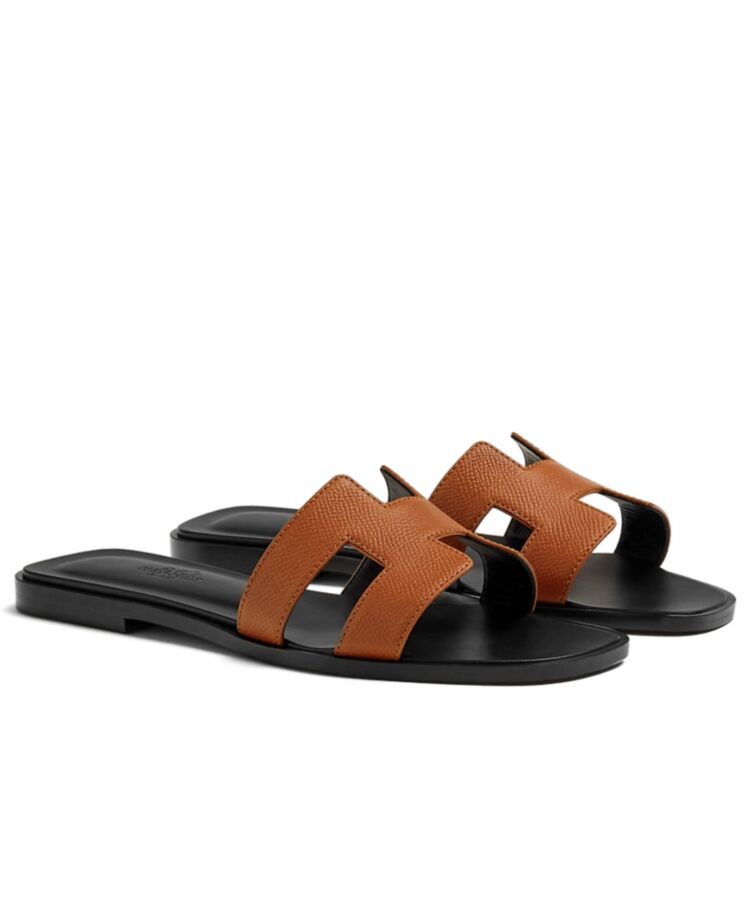 Her..mes Women’s Oran Sandal Coffee