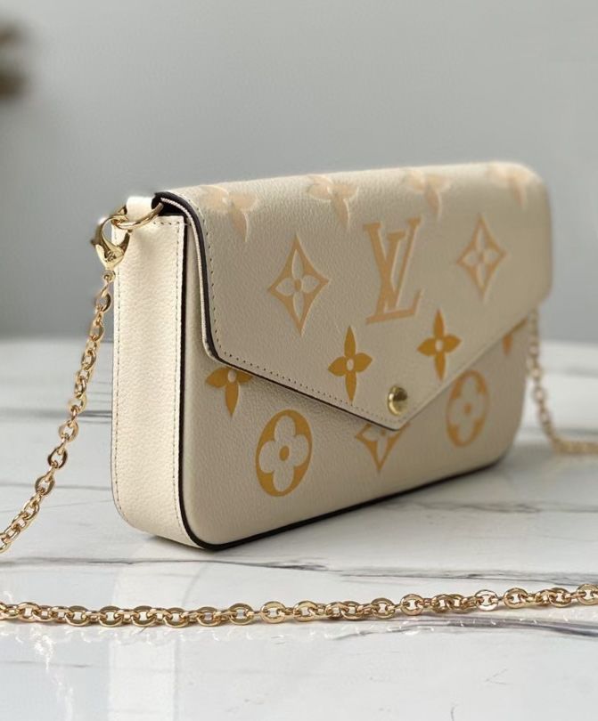 L.*V Felicie, Pochette M80498, Monogram Empreinte Leather, Summer 2021 Collection, Luxury Leather Goods